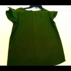 Green ruffled top